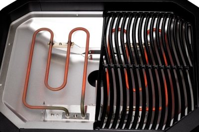 Blick in den Cozze E-500: Innenraum des Cozze E-500 Elektrogrills mit sichtbaren Heizelementen Blick in den Cozze E-500: Innenraum des Cozze E-500 Elektrogrills mit sichtbaren Heizelementen