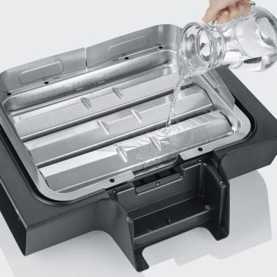 Severin Elektro Tischgrill Wasser in die Auffangschale füllen Severin Elektro Tischgrill funktioniert mit Wasser